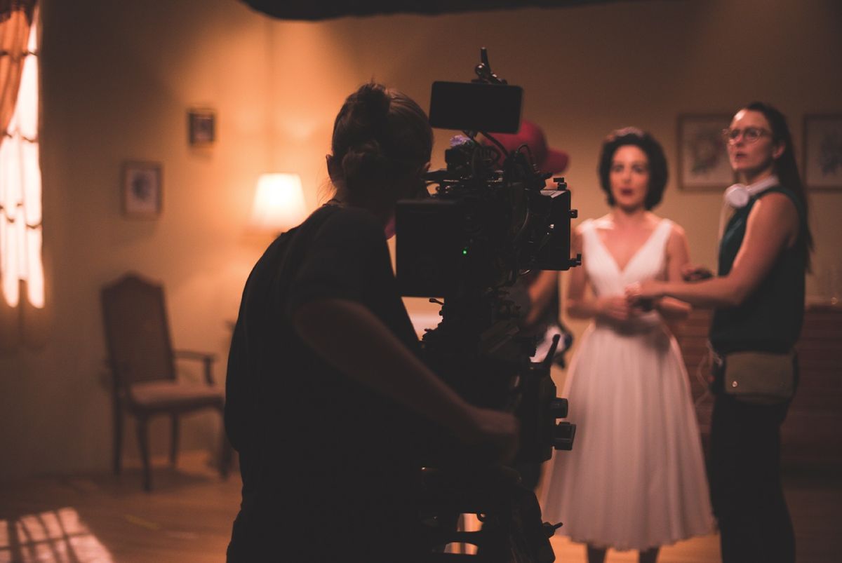 Cinematographer Katharine White at the camera while director Foster Wilson confers with Grace Kendall.