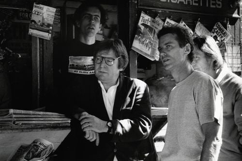 Director Alan Parker (left) and cinematographer Michael Seresin, BSC, on location in New York. Partially visible behind Seresin is camera operator Mike Roberts. The crewmember behind Parker could not be identified.