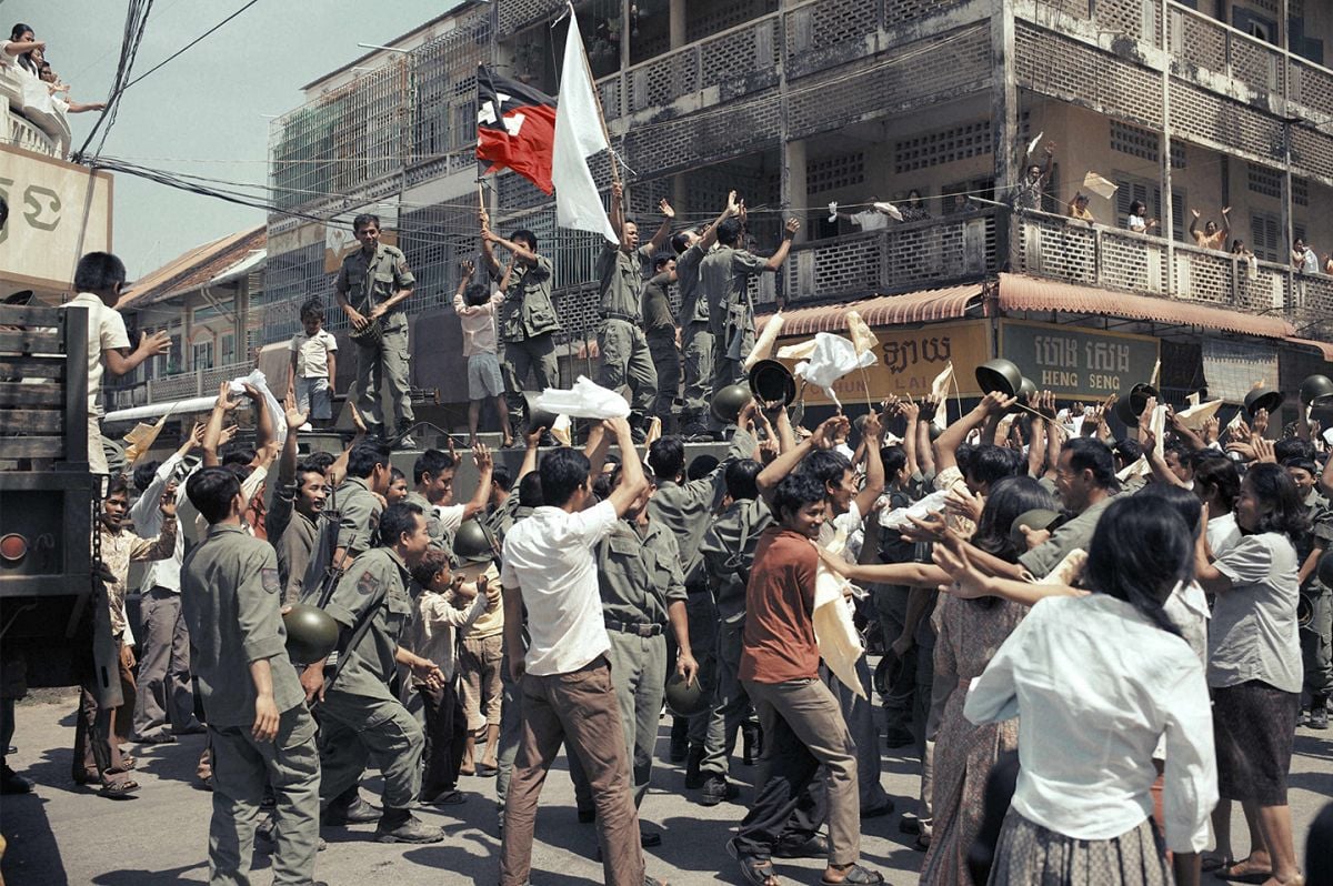 The Khmer Rouge flag flies as soldiers take the city. The production shot on location in Cambodia, including the cities of Phnom Penh, Siem Reap and Battambang.