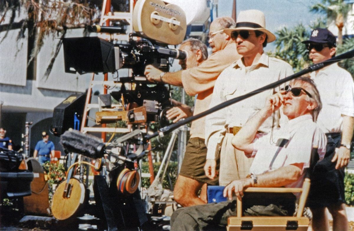 Shooting Cape Fear on location in Florida, Francis examines his light while Scorsese and the crew stand by.