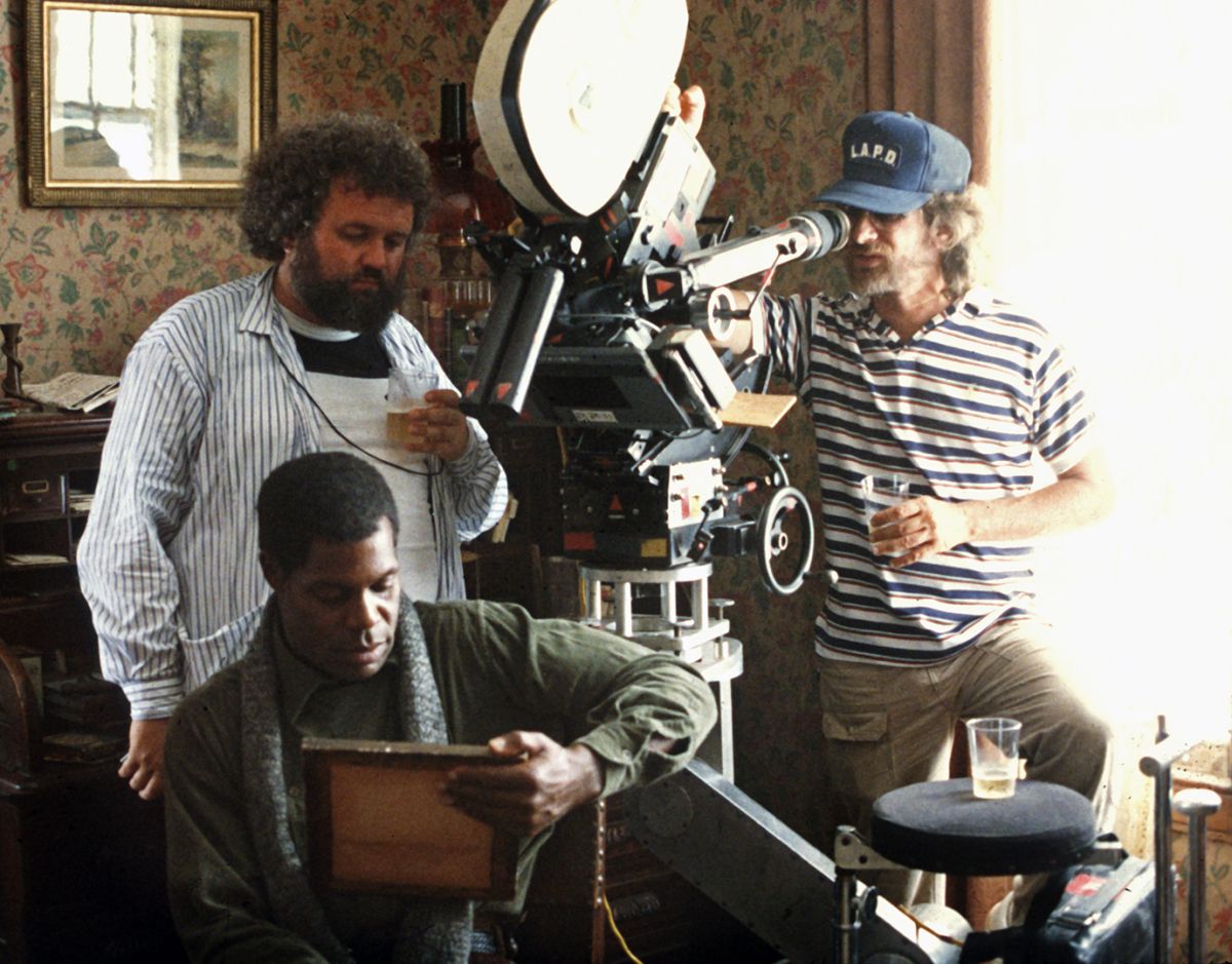 Daviau and director Steven Spielberg (at eyepiece) line up a shot over actor Danny Glover.