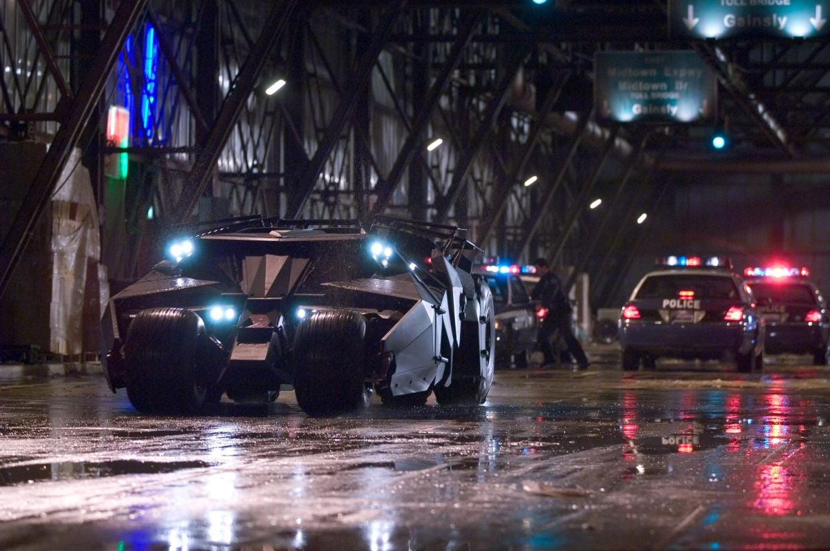 The Batmobile attempts to elude police pursuit during the film’s climactic chase. “It was very important to me how the car was lit,” Pfister says. “In designing the car together, Nathan and Chris came up with a very clever pattern of lights for the headlight arrangement. I love the way those lights look; they’re very tiny, pinpoint sources that are very bright.”